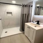 3-Bed Suite with Separate Queen Bed Area (Parking area view)